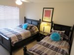 Bedroom with one full and one twin bed